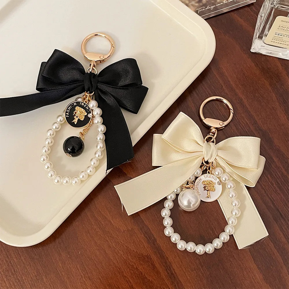 Luxury Pearl Bow Keychain with Mini Perfume Charm