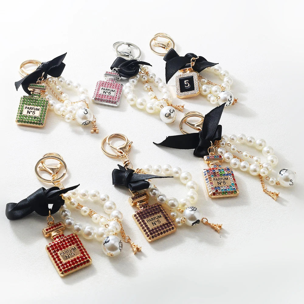 Luxury Pearl Bow Keychain with Mini Perfume Charm