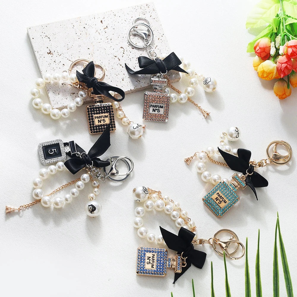 Luxury Pearl Bow Keychain with Mini Perfume Charm