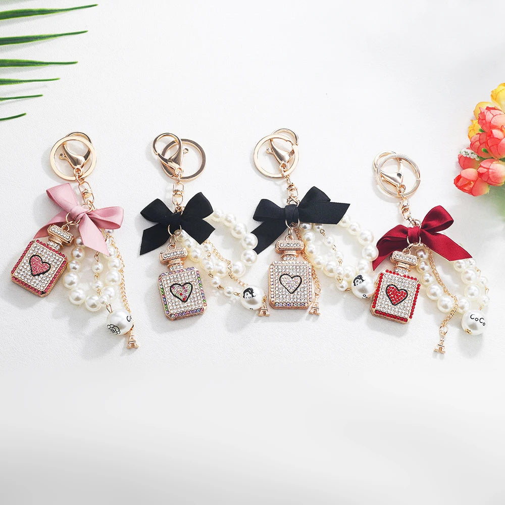Luxury Pearl Bow Keychain with Mini Perfume Charm