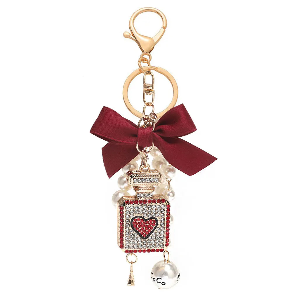 Luxury Pearl Bow Keychain with Mini Perfume Charm