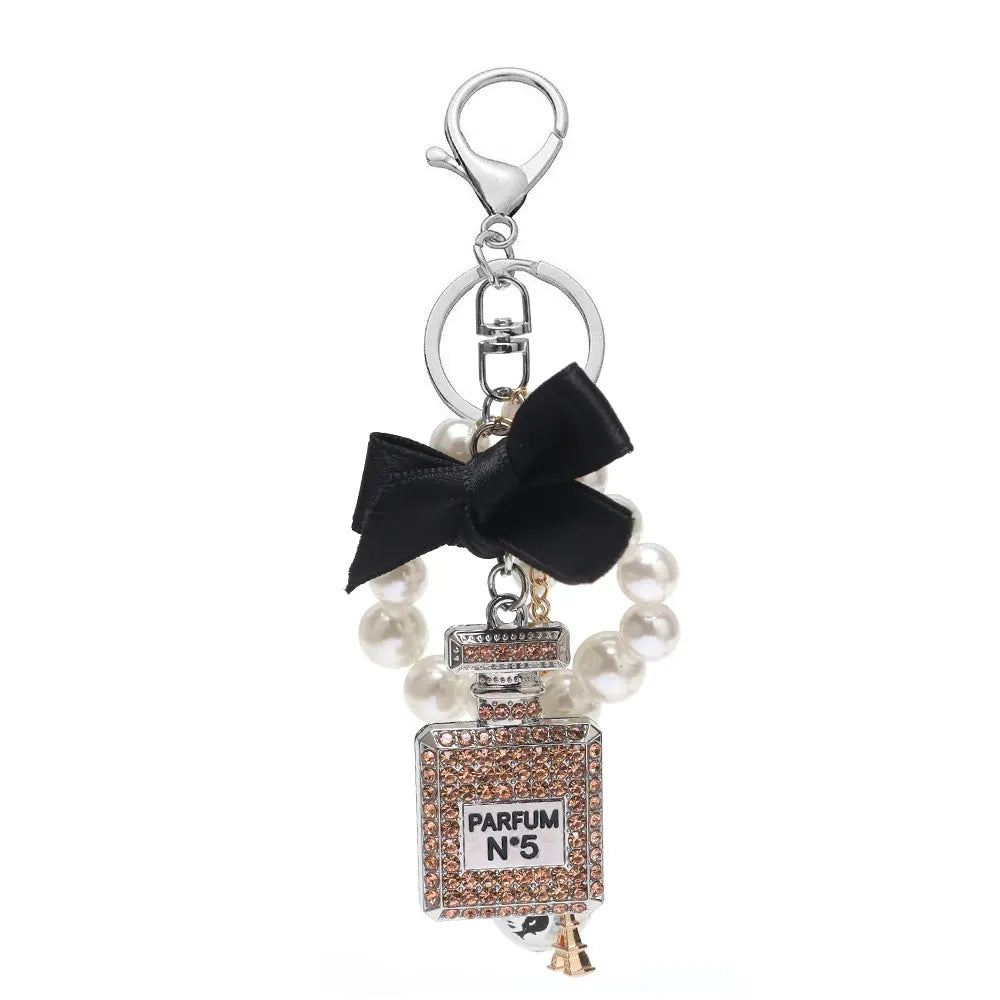 Luxury Pearl Bow Keychain with Mini Perfume Charm